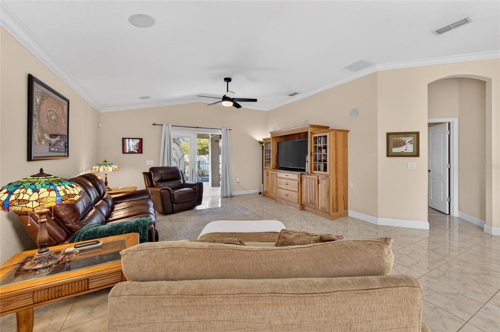 1864 Orange Tree Drive Edgewater, FL 32141 - Photo 20 of 38 a living room with furniture and a couch