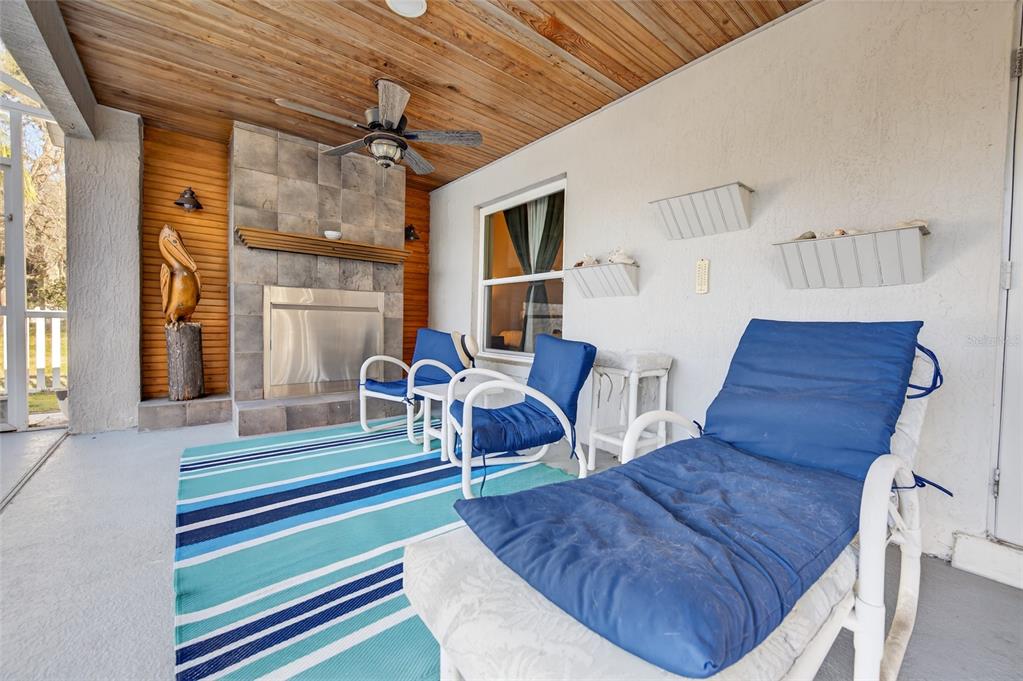1864 Orange Tree Drive Edgewater, FL 32141 - Photo 27 of 38 a living room with furniture and wooden floor