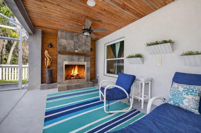 a room with furniture and a fireplace