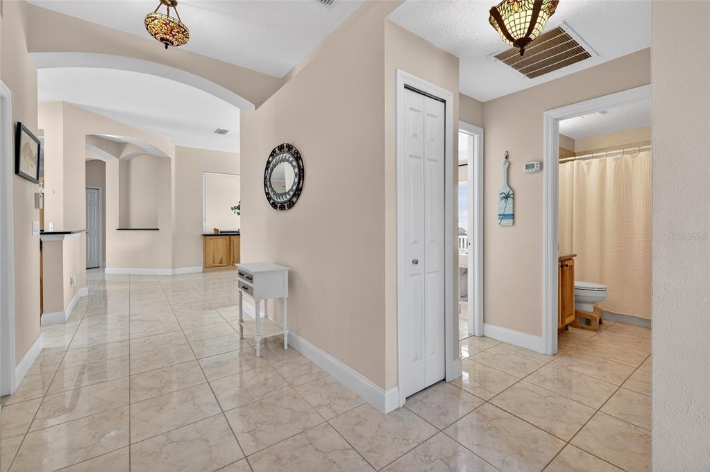 1864 Orange Tree Drive Edgewater, FL 32141 - Photo 34 of 38 a view of room with window and a chandelier