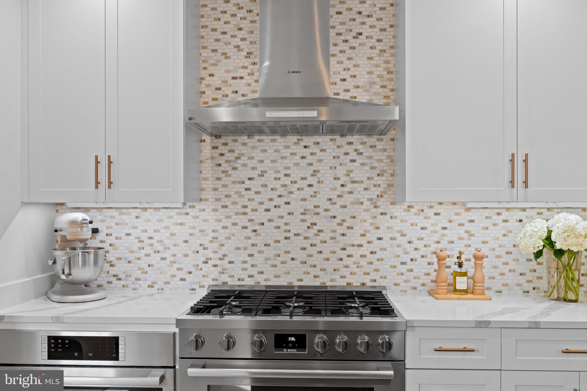 910 8th Street Northeast Washington, DC 20002 - Photo 12 of 54 a kitchen with a stove and a white cabinets