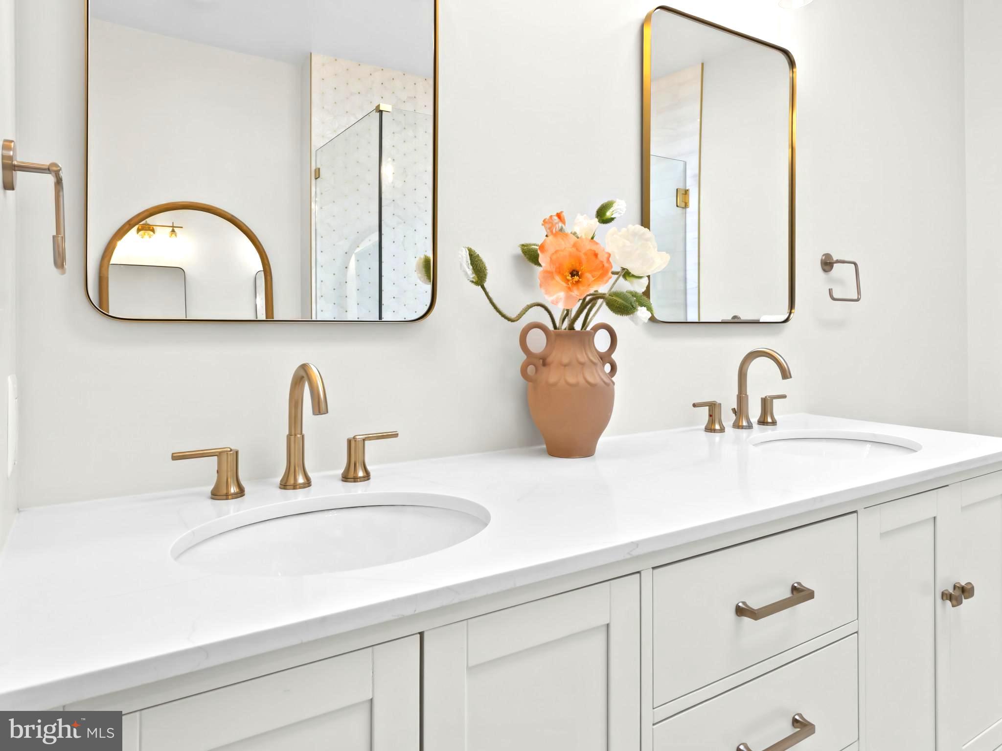 910 8th Street Northeast Washington, DC 20002 - Photo 33 of 54 a bathroom with sink and mirror