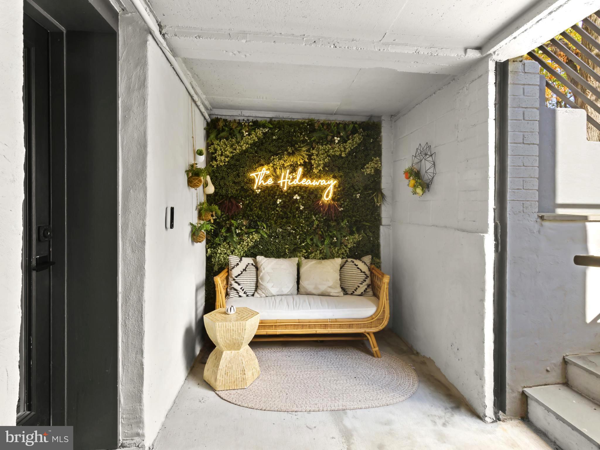 910 8th Street Northeast Washington, DC 20002 - Photo 36 of 54 a living room with furniture and a white door