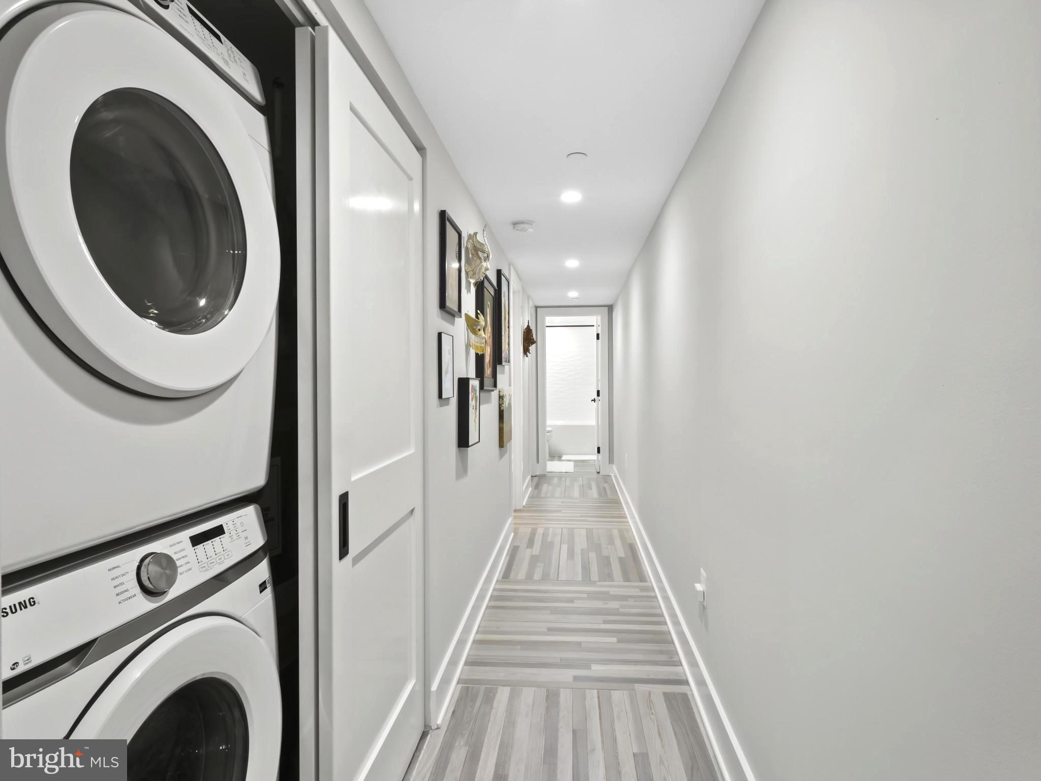 910 8th Street Northeast Washington, DC 20002 - Photo 39 of 54 a view of a hallway with washer and dryer
