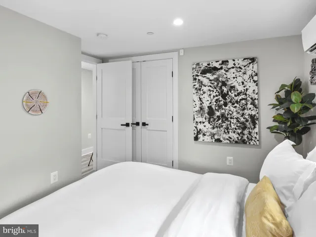 a view of a house with wooden fence