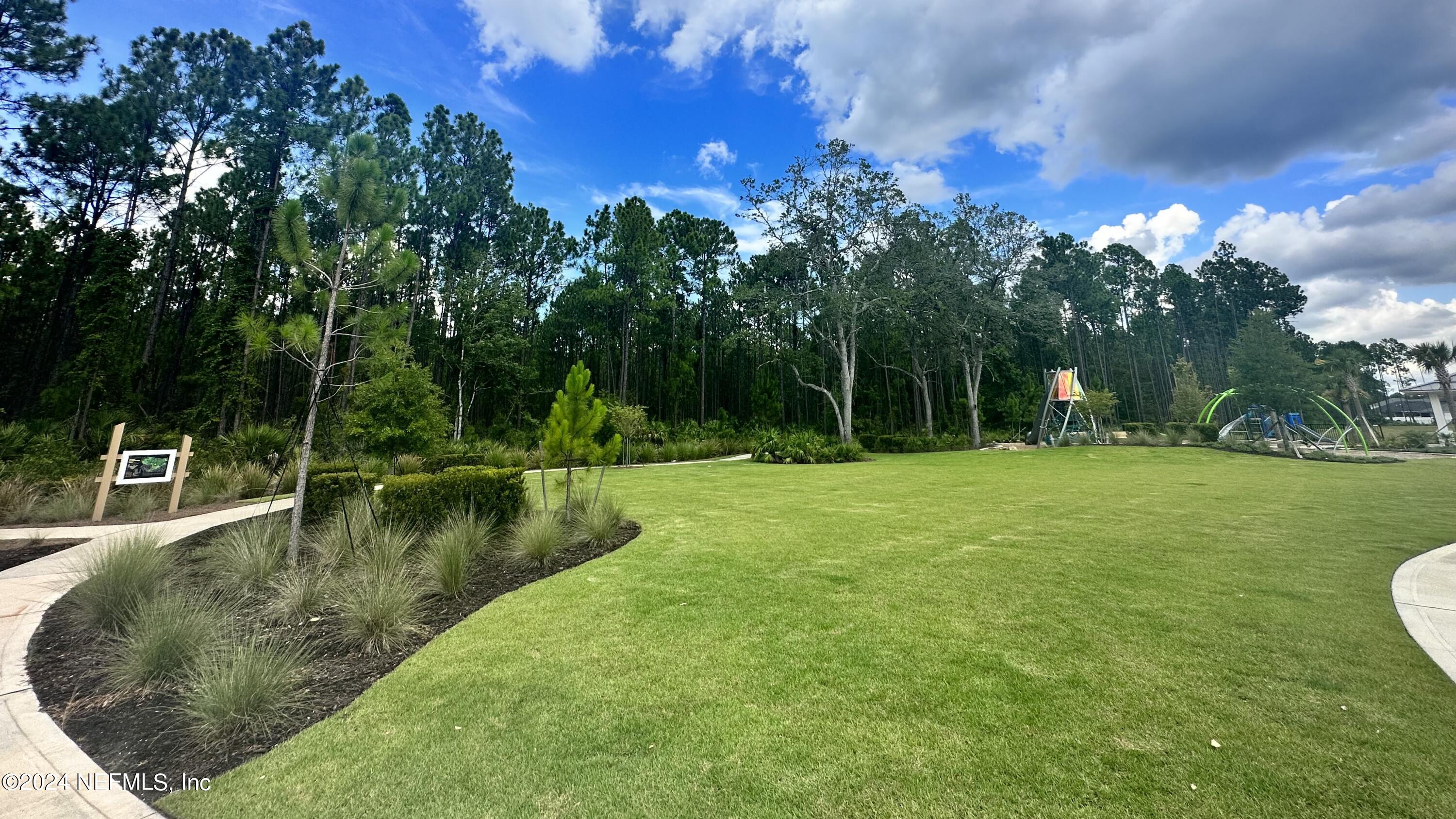 64 Cordelle Street St. Johns, FL 32259 - Photo 56 of 58 a view of a swimming pool with a yard