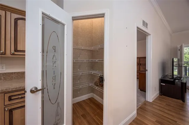 a bathroom with a shower and a mirror