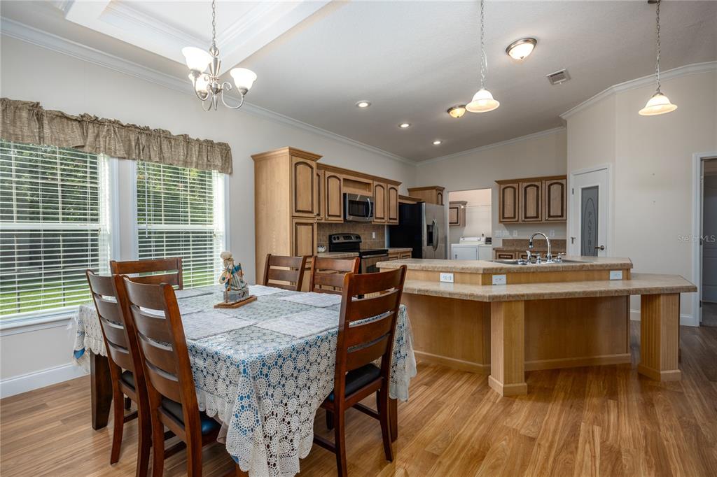 1759 Northeast 127th Street Branford, FL 32008 - Photo 15 of 45 a view of a dining room with furniture window and wooden floor