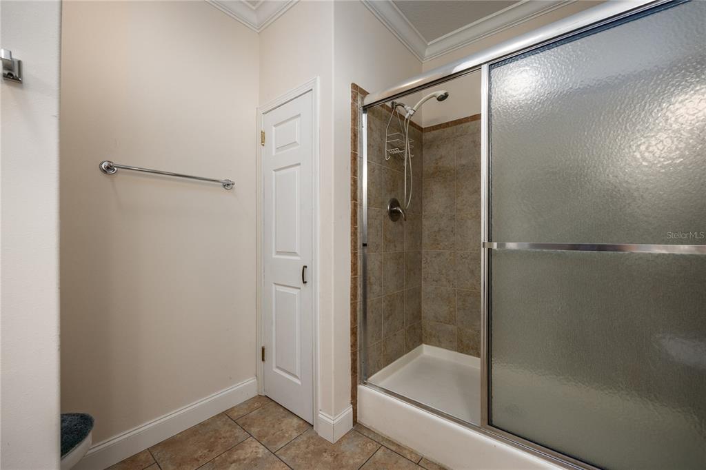 1759 Northeast 127th Street Branford, FL 32008 - Photo 22 of 45 a bathroom with a glass shower door