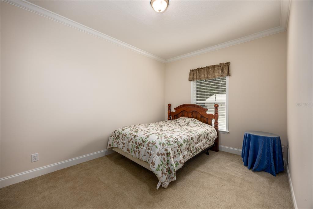 1759 Northeast 127th Street Branford, FL 32008 - Photo 24 of 45 a bedroom with a bed and a window