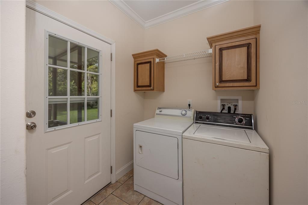 1759 Northeast 127th Street Branford, FL 32008 - Photo 26 of 45 a utility room with dryer and washer