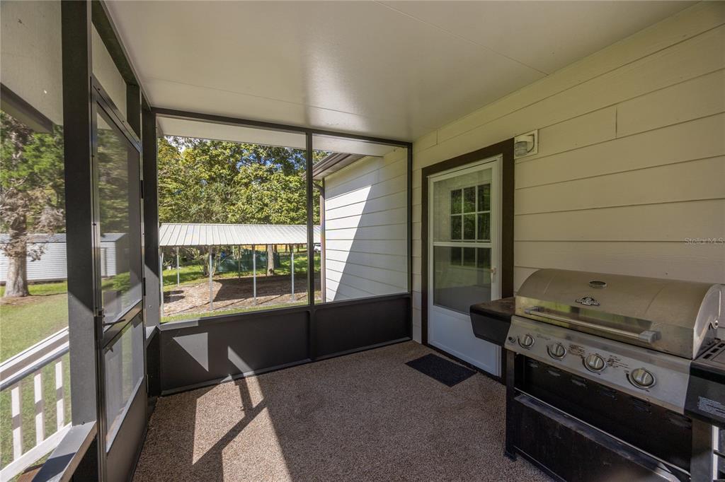 1759 Northeast 127th Street Branford, FL 32008 - Photo 27 of 45 a living room with a large window