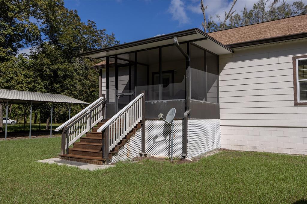 1759 Northeast 127th Street Branford, FL 32008 - Photo 28 of 45 a view of a chair with a small yard