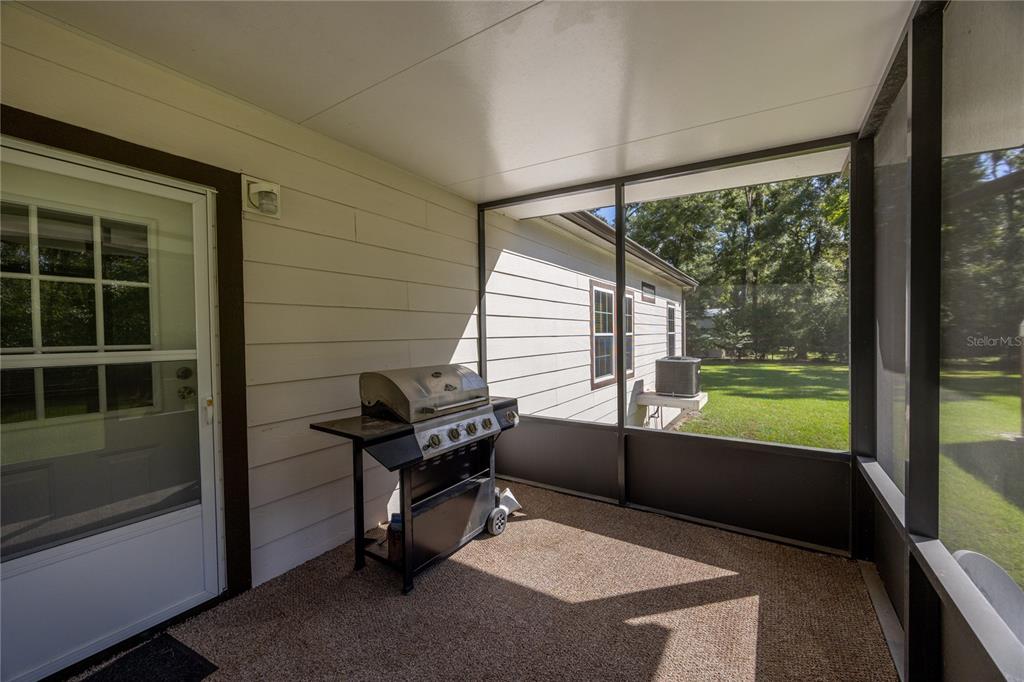1759 Northeast 127th Street Branford, FL 32008 - Photo 30 of 45 a balcony with furniture and a window
