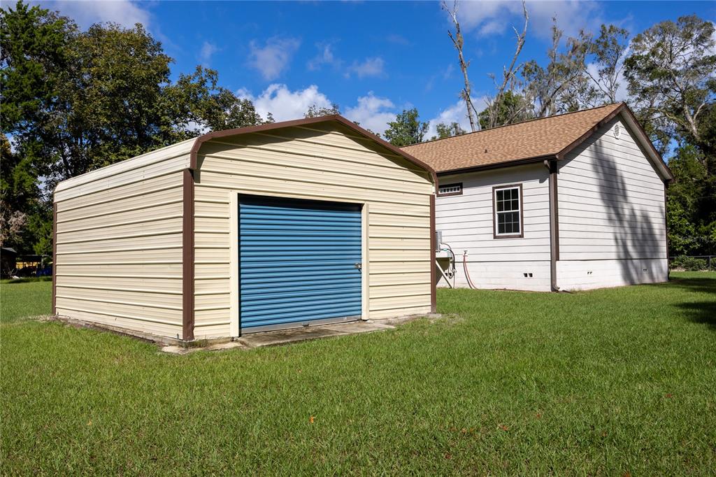 1759 Northeast 127th Street Branford, FL 32008 - Photo 31 of 45 a view of a house with a yard