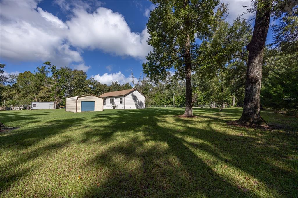 1759 Northeast 127th Street Branford, FL 32008 - Photo 38 of 45 a view of a house with a yard
