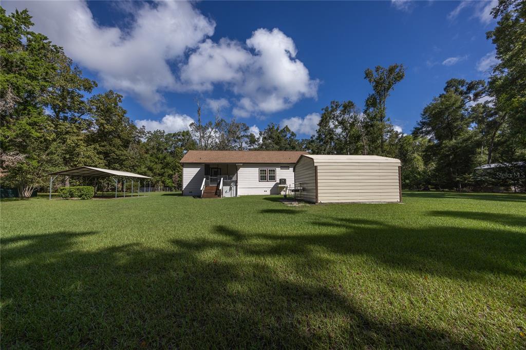 1759 Northeast 127th Street Branford, FL 32008 - Photo 39 of 45 a view of a house with a big yard