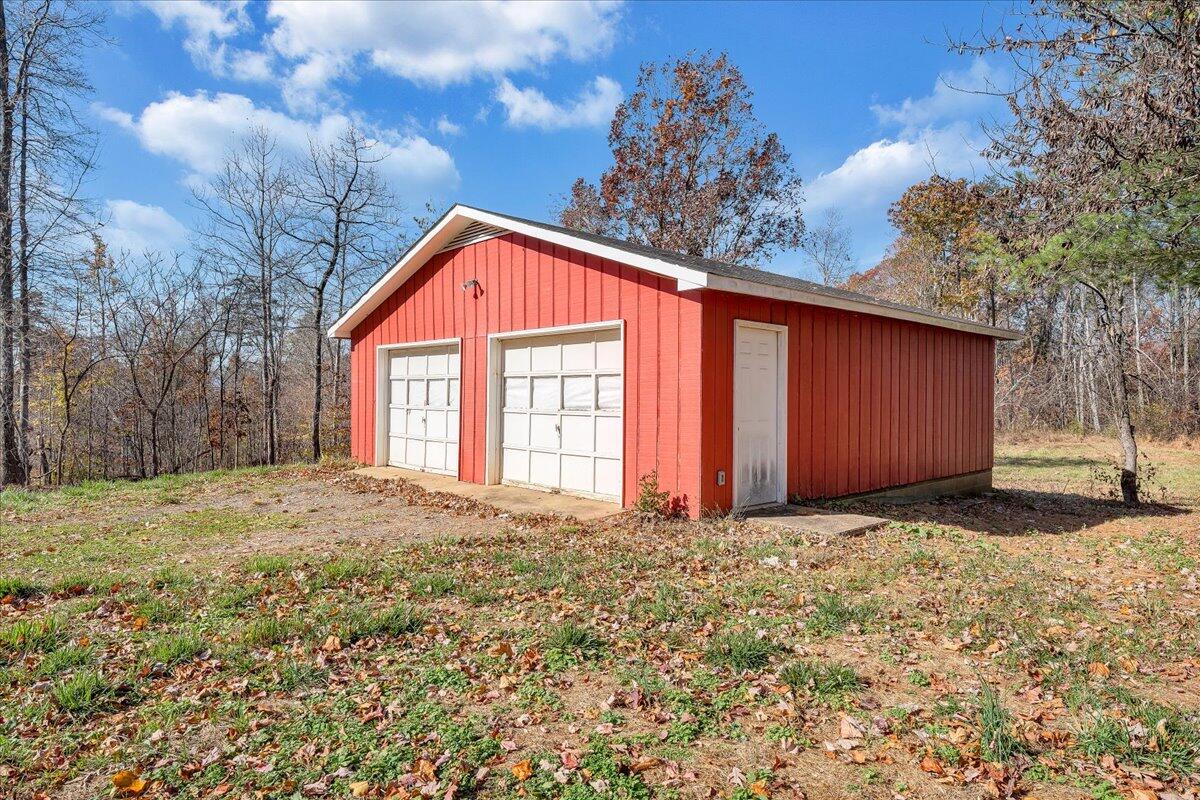 2353 Thompson Ridge Road Ferrum, VA 24088 - Photo 41 of 46 a front view of a house with a yard