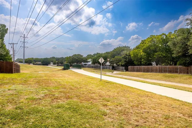 a view of swimming pool with an outdoor space and seating area