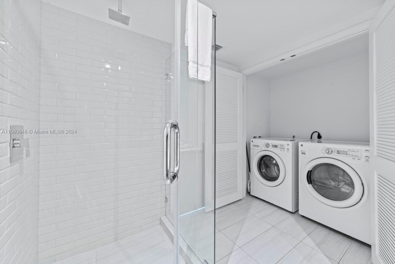 4010 South Ocean Drive, Unit R2505 Hollywood, FL 33019 - Photo 13 of 25 a utility room with dryer and washer