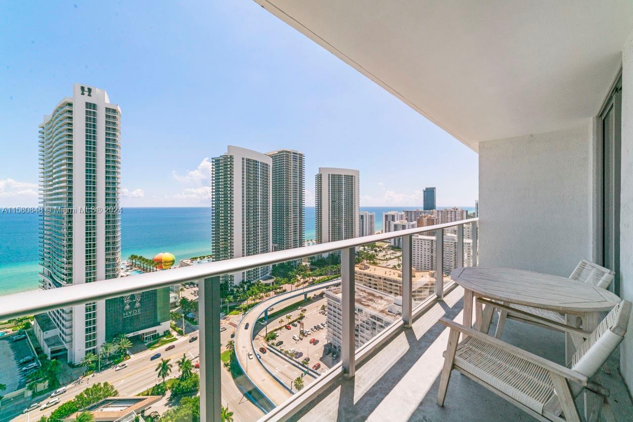 4010 South Ocean Drive, Unit R2505 Hollywood, FL 33019 - Photo 19 of 25 a view of a balcony with furniture