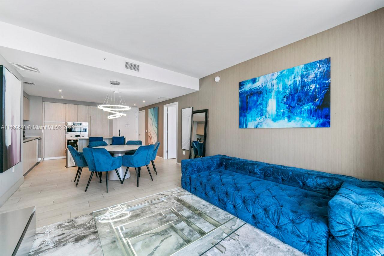 4010 South Ocean Drive, Unit R2505 Hollywood, FL 33019 - Photo 7 of 25 a view of a livingroom with furniture and a lounge chair