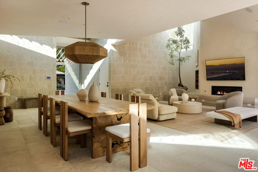 1600 Rising Glen Road Los Angeles, CA 90069 - Photo 12 of 28 a view of a livingroom with furniture and a chandelier