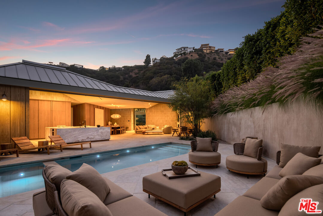 1600 Rising Glen Road Los Angeles, CA 90069 - Photo 28 of 28 a outdoor space with patio furniture and a potted plants