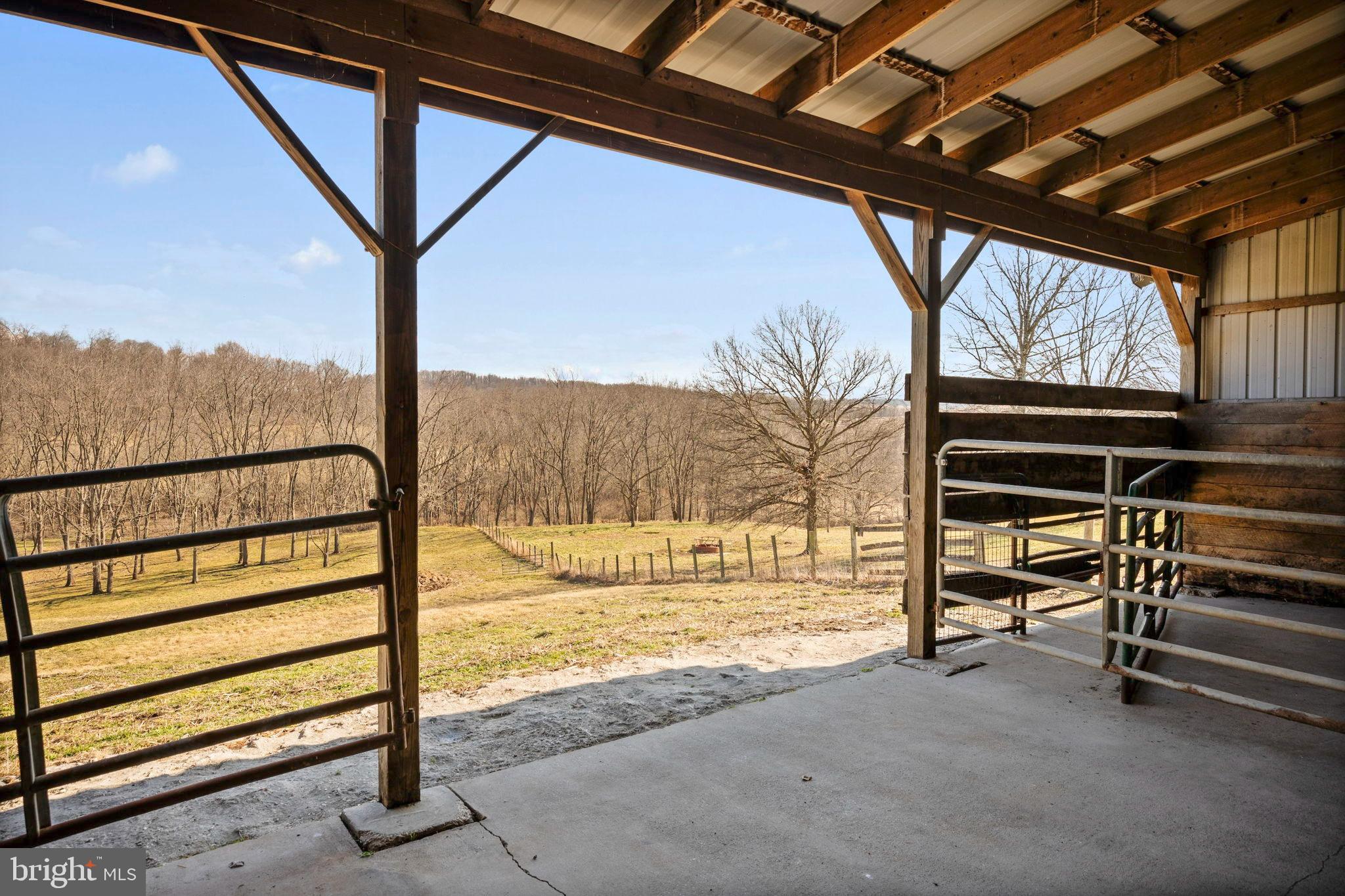 1485 Bachmans Valley Road Westminster, MD 21158 - Photo 59 of 91 Scenic views from a rustic barn doorway.