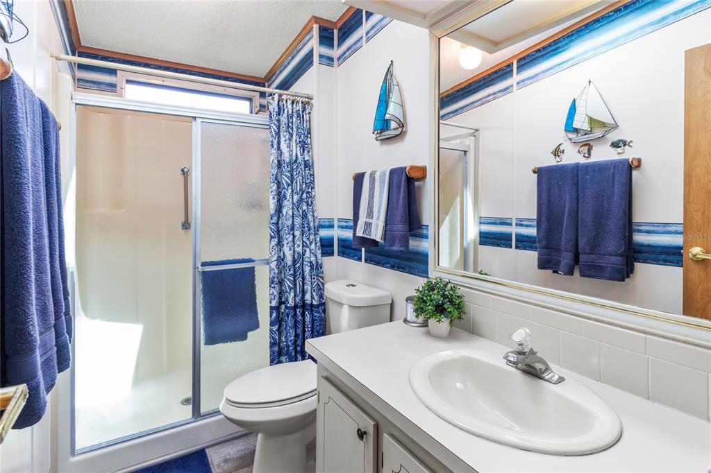 83 Eagle Circle Ellenton, FL 34222 - Photo 32 of 60 a bathroom with a sink toilet and shower