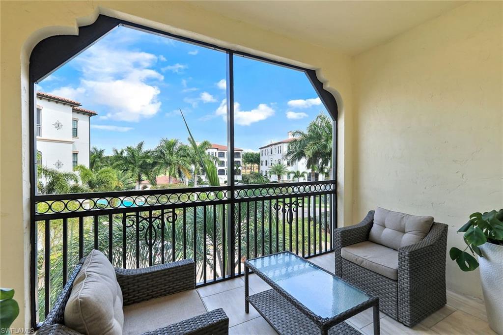 16445 Carrara Way, Unit 202 Naples, FL 34110 - Photo 22 of 35 a view of a balcony with furniture