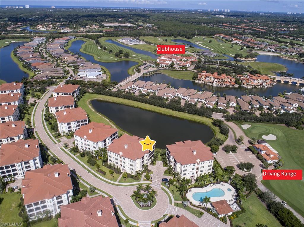 16445 Carrara Way, Unit 202 Naples, FL 34110 - Photo 26 of 35 an aerial view of a houses with a lake