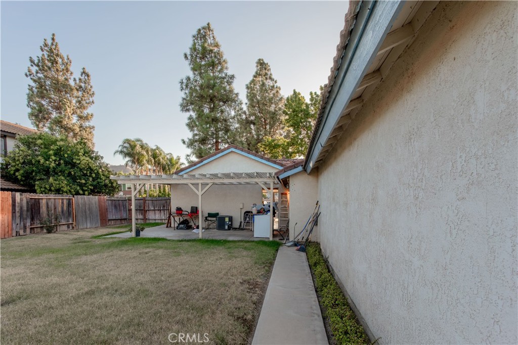 3579 Paine Drive Riverside, CA 92503 - Photo 27 of 31 a view of a house with backyard and trees