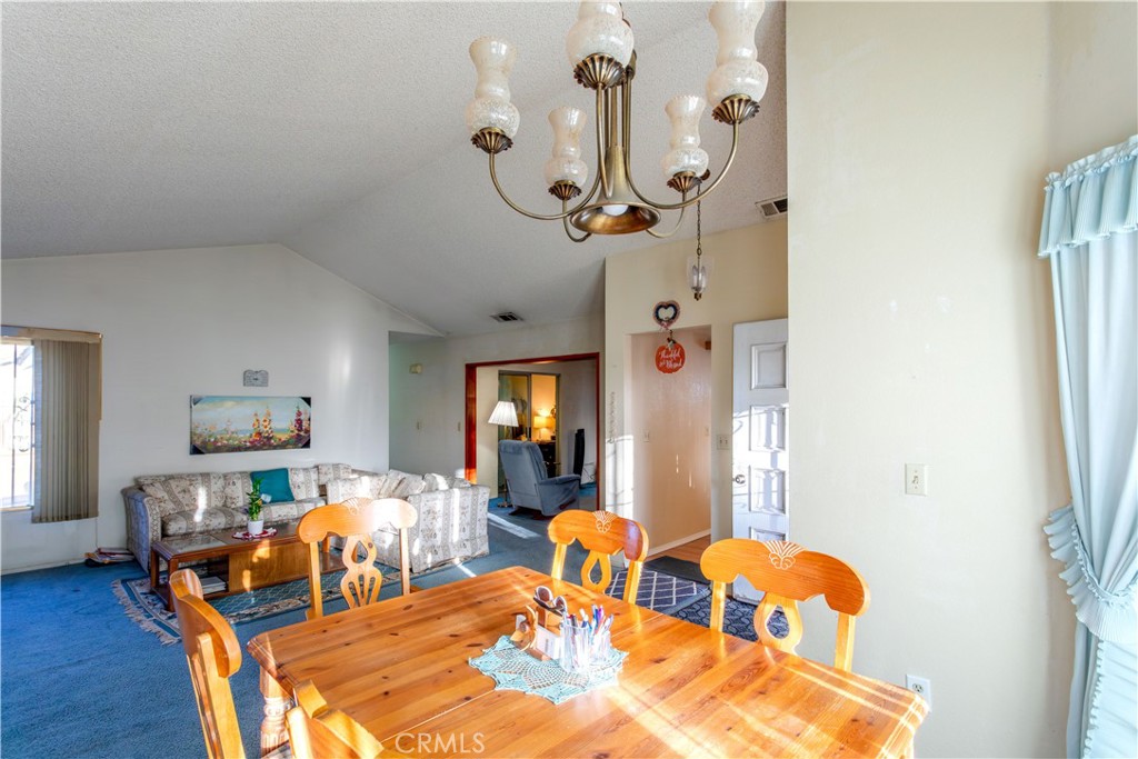 3579 Paine Drive Riverside, CA 92503 - Photo 10 of 31 a dining room with wooden floor table and chairs