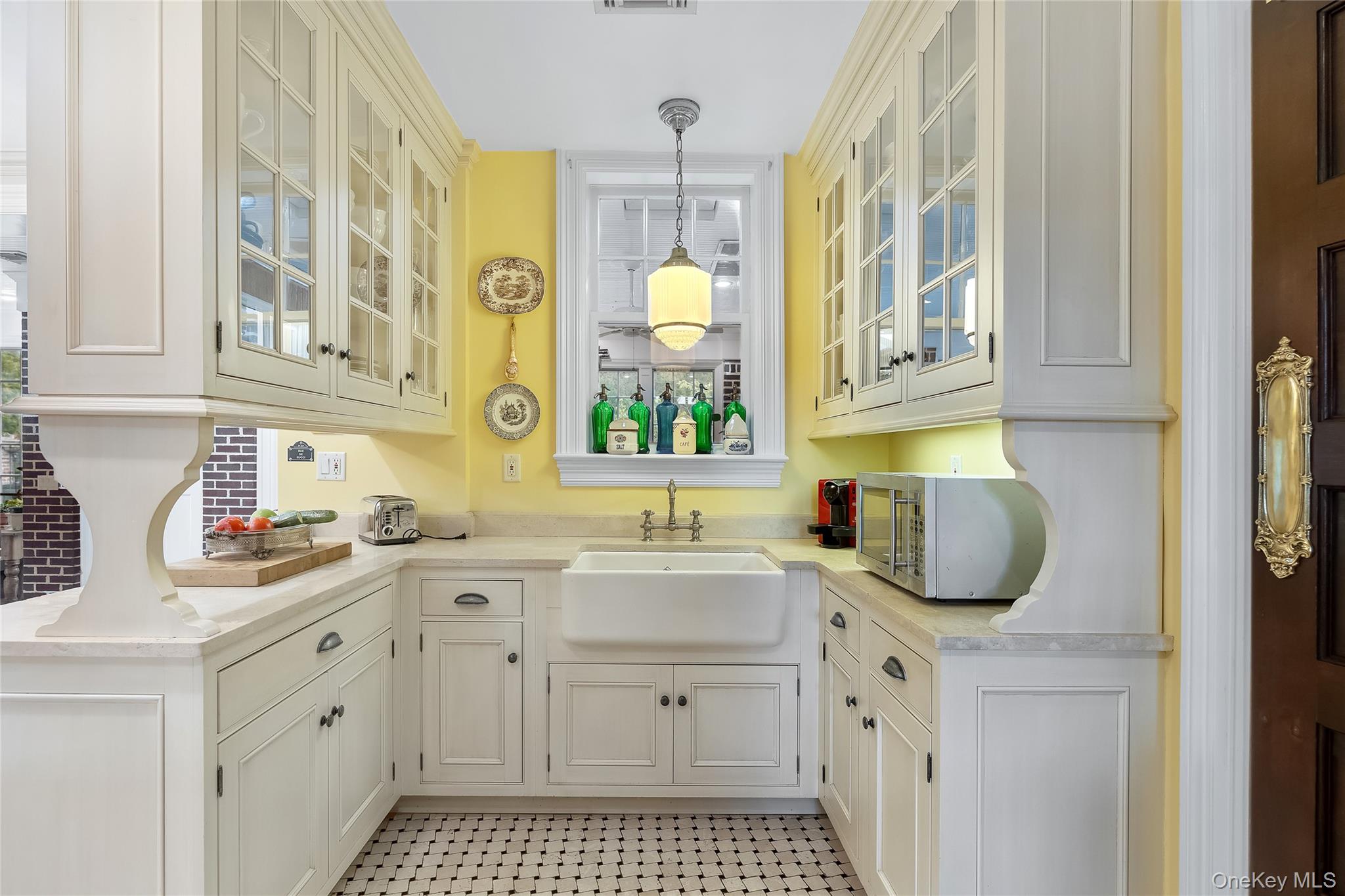 1-27 Beverly Road Queens, NY 11363 - Photo 33 of 46 a kitchen with a sink stove and cabinets