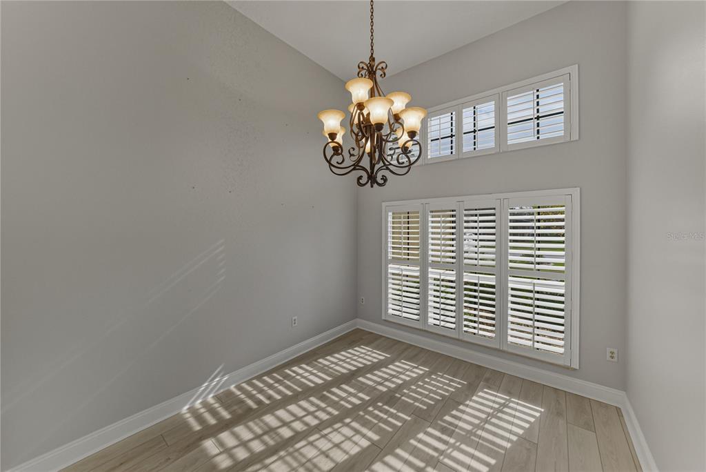 8725 Mississippi Run Spring Hill, FL 34613 - Photo 27 of 72 a view of an empty room with a window