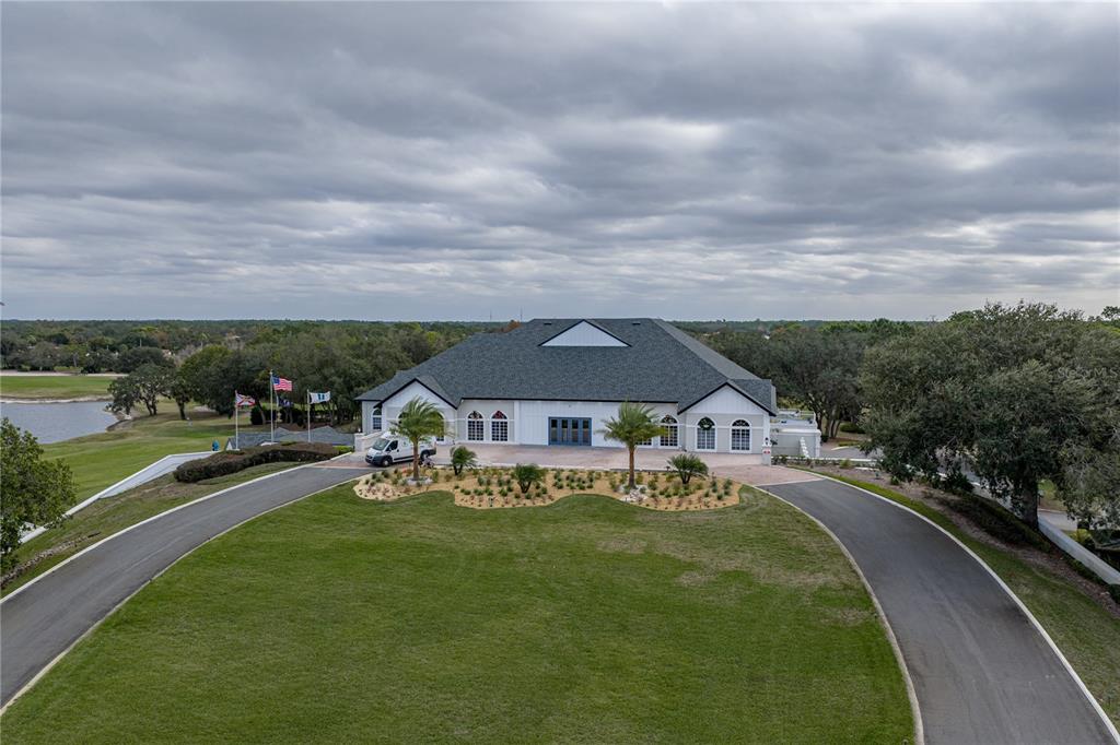 8725 Mississippi Run Spring Hill, FL 34613 - Photo 60 of 72 a view of a house with a big yard