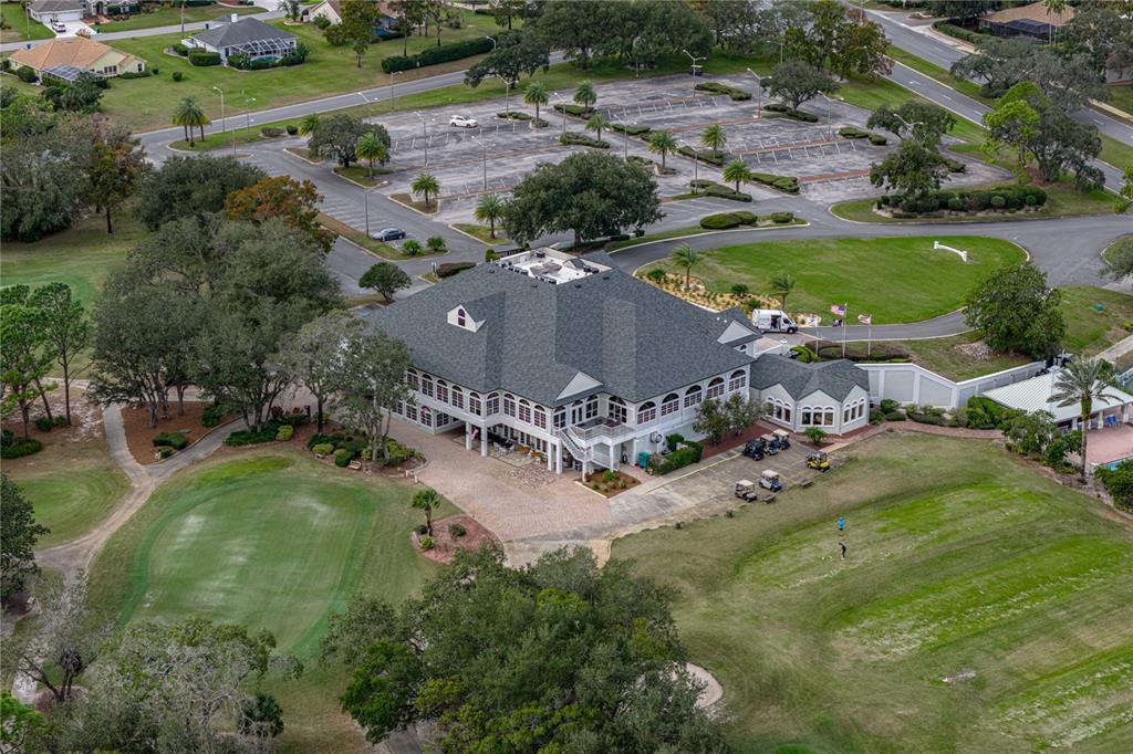 8725 Mississippi Run Spring Hill, FL 34613 - Photo 65 of 72 an aerial view of a house with a yard and lake view
