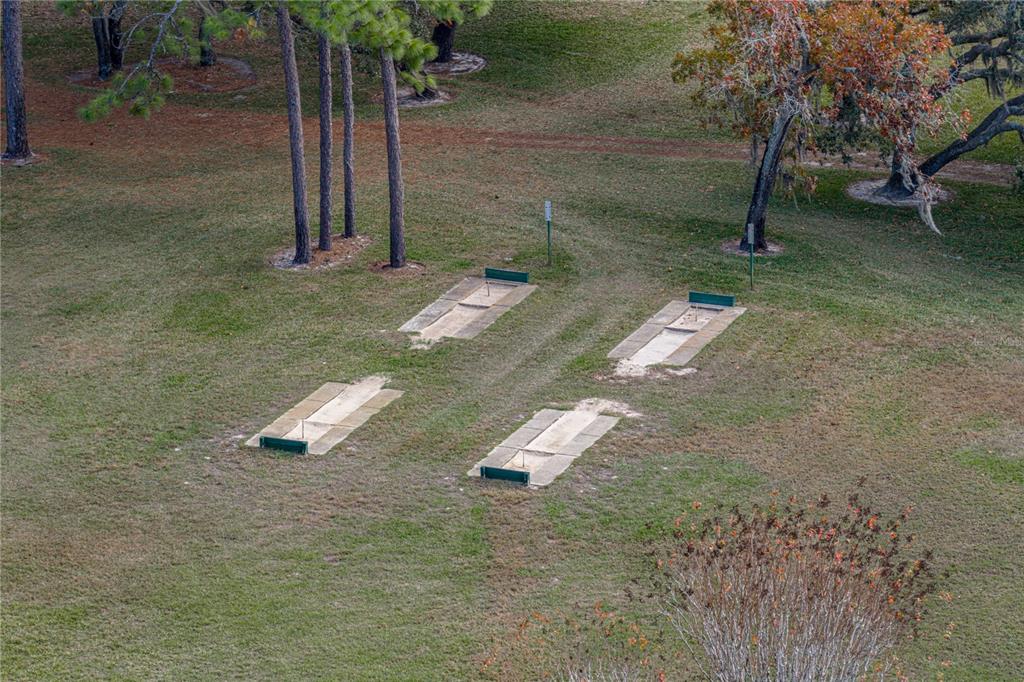 8725 Mississippi Run Spring Hill, FL 34613 - Photo 70 of 72 a backyard of a house with lots of green space
