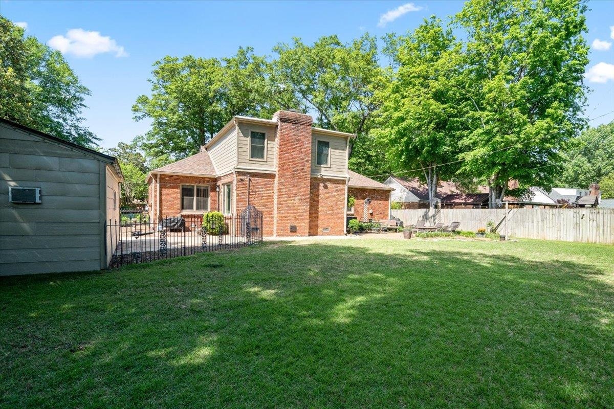 4847 Kaye Road Memphis, TN 38117 - Photo 32 of 40 a view of a house with a backyard