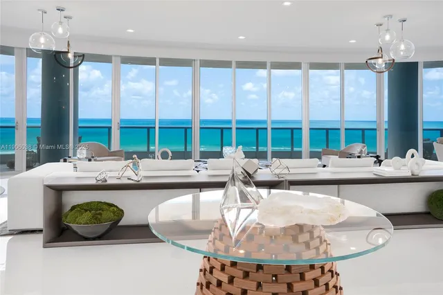 a kitchen with kitchen island a counter top space appliances and cabinets