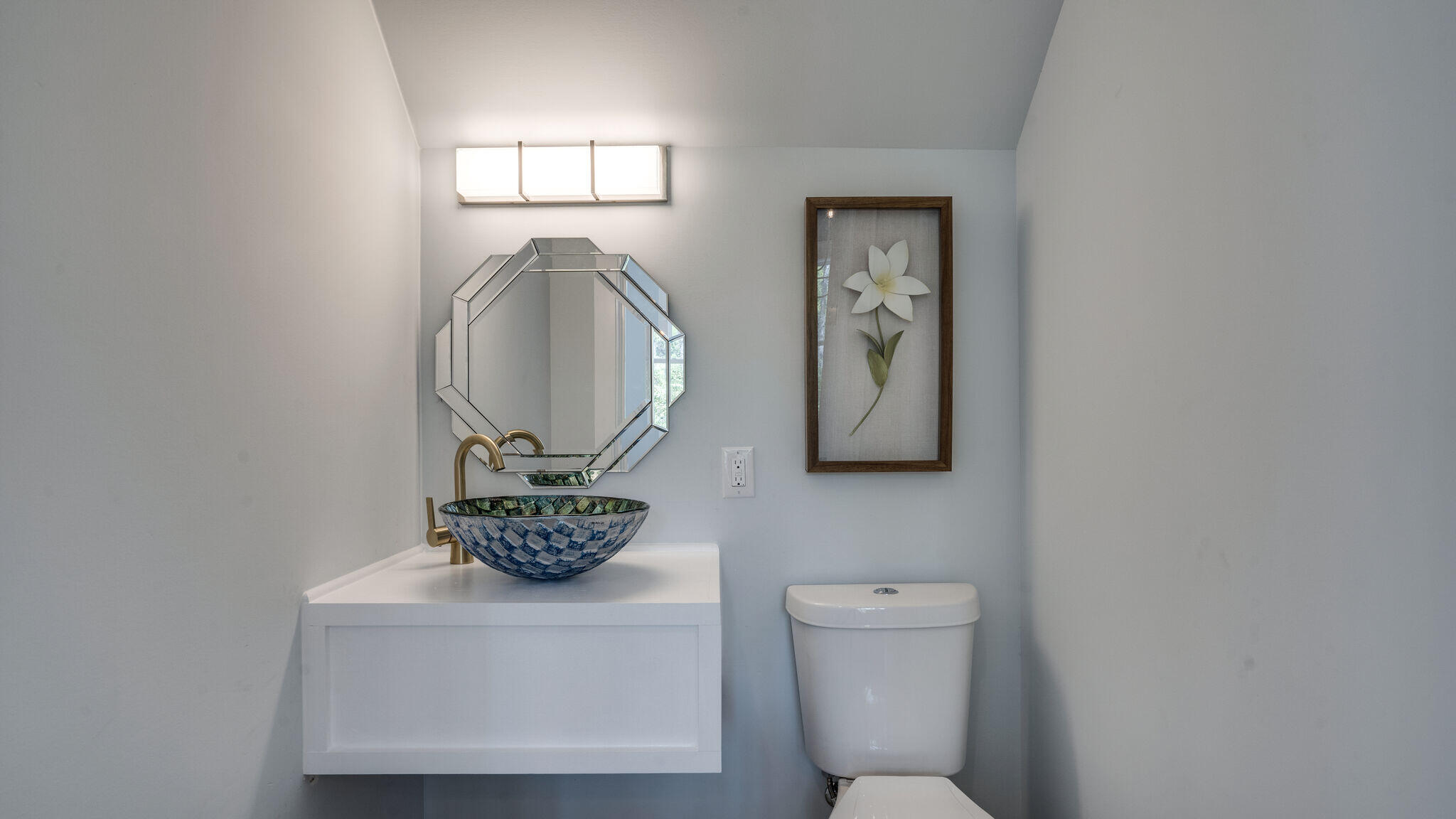 393 Redbud Ln Inlet Beach Inlet Beach, FL 32461 - Photo 13 of 46 a bathroom with a toilet a sink and mirror
