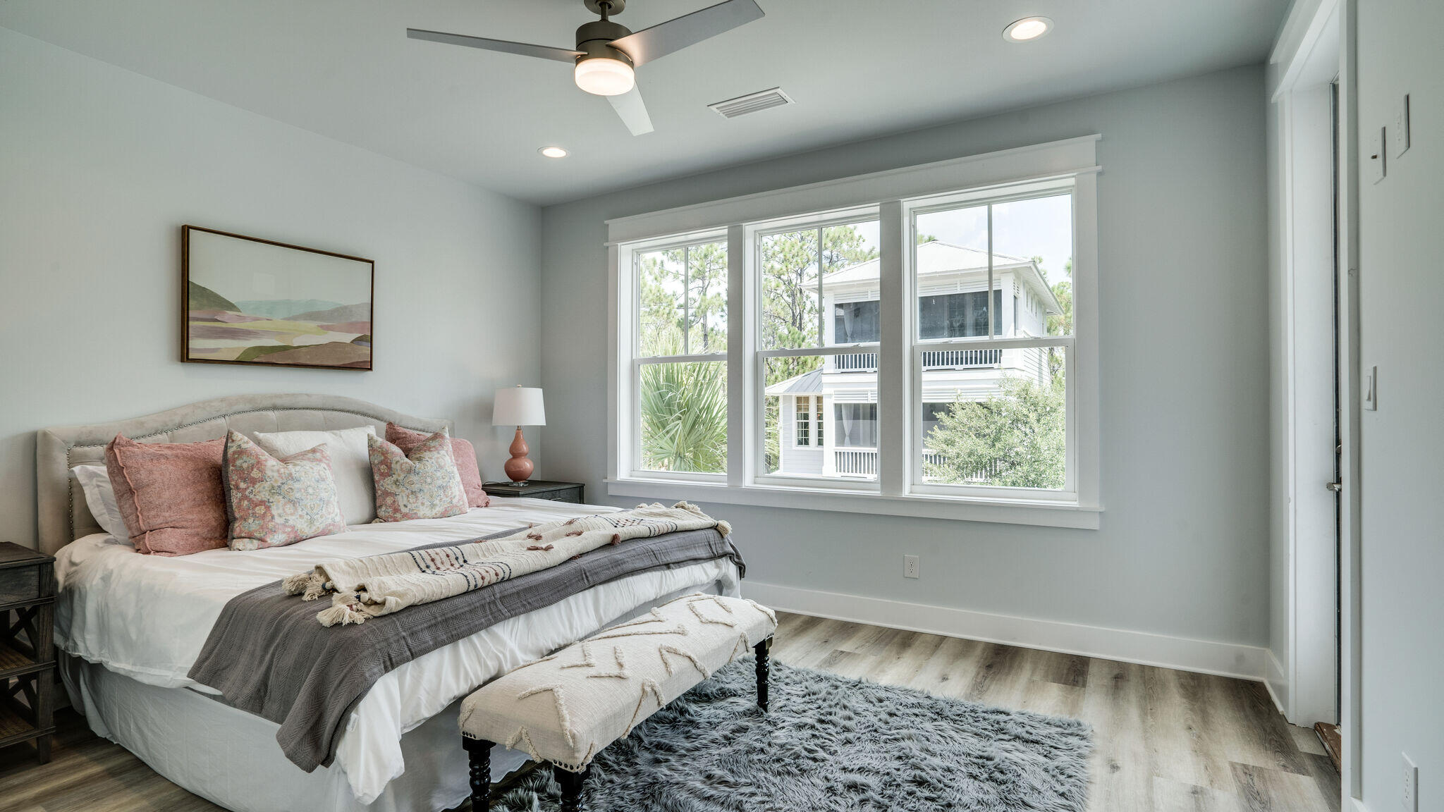 393 Redbud Ln Inlet Beach Inlet Beach, FL 32461 - Photo 18 of 46 a spacious bedroom with a bed and a window