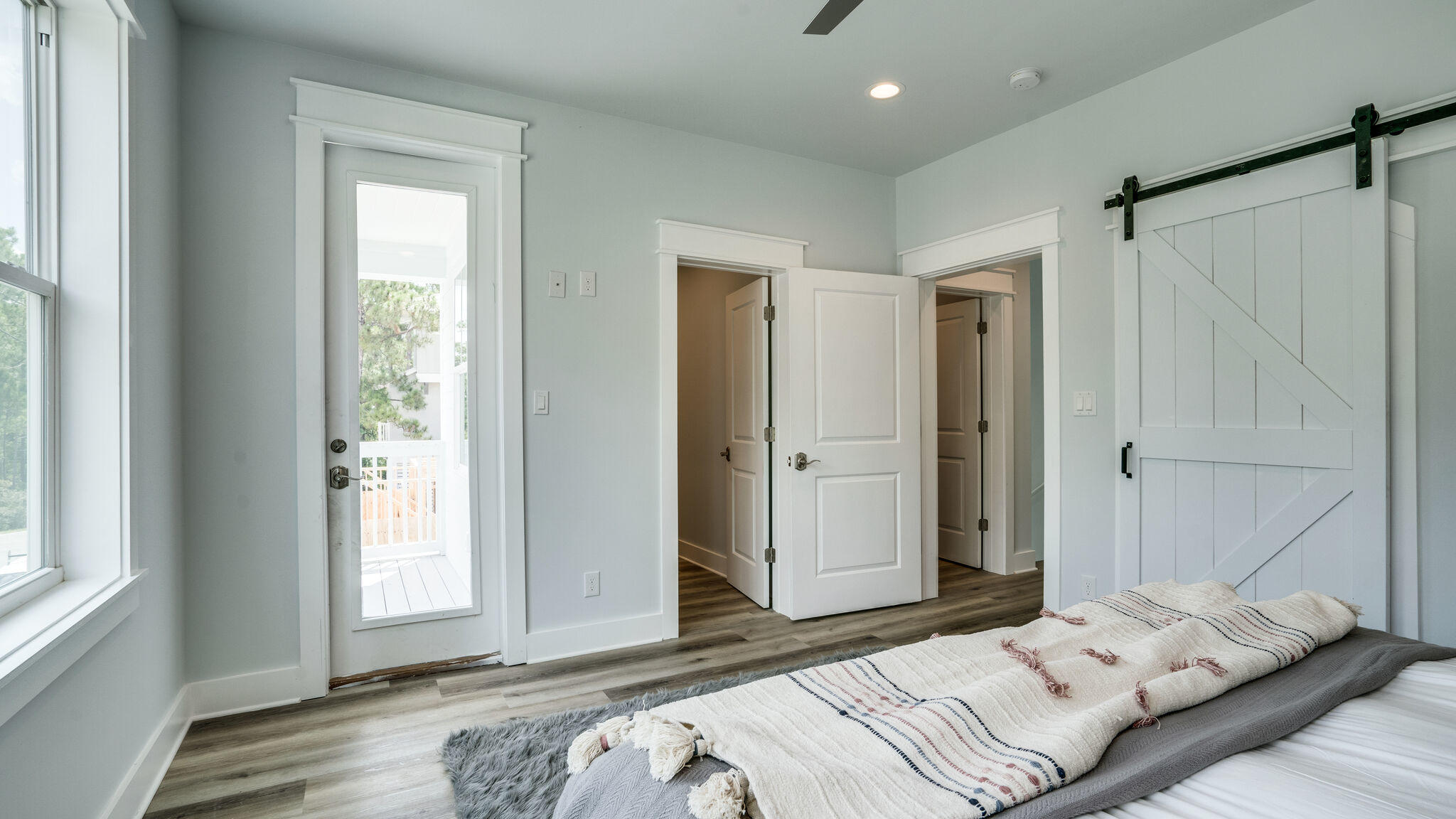 393 Redbud Ln Inlet Beach Inlet Beach, FL 32461 - Photo 19 of 46 a bedroom with a bed and a window