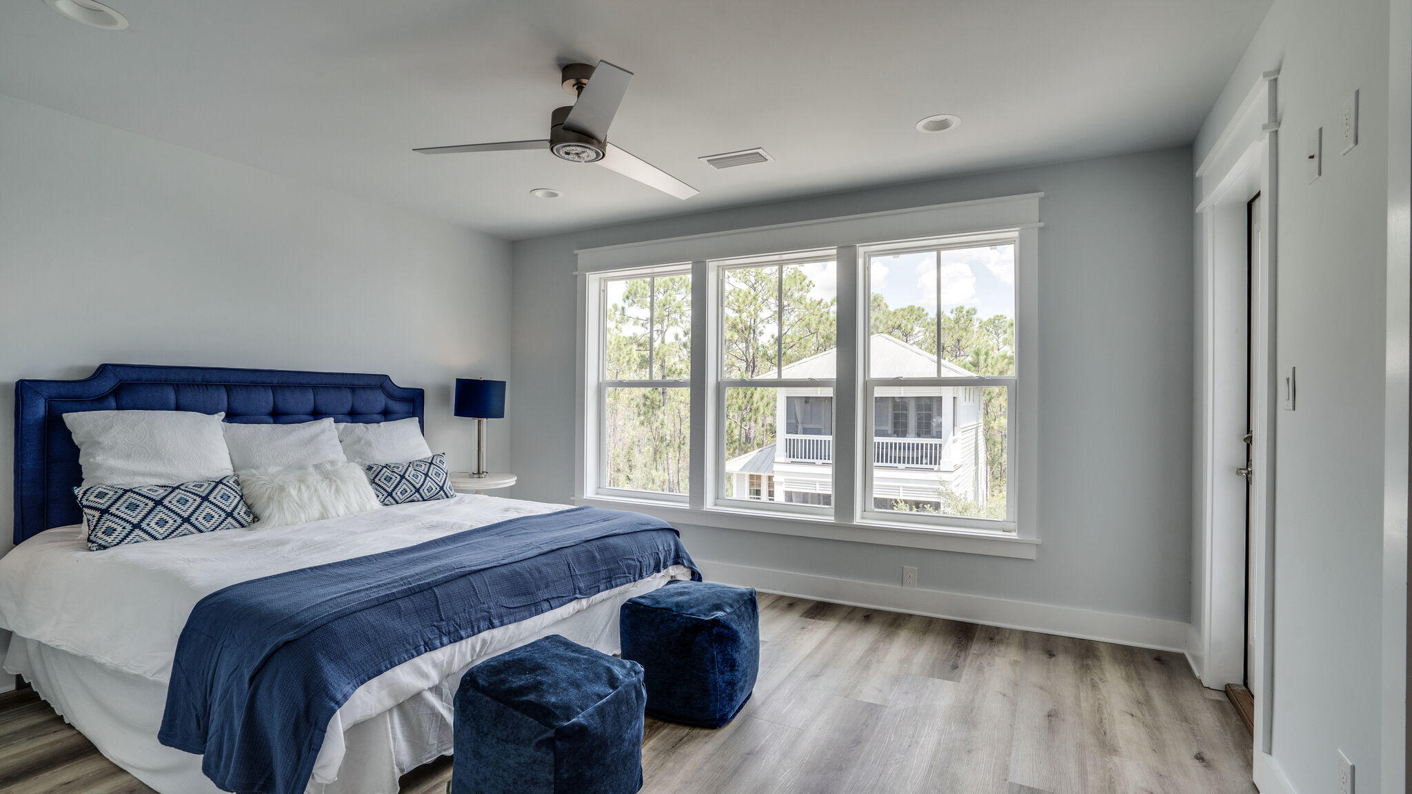 393 Redbud Ln Inlet Beach Inlet Beach, FL 32461 - Photo 23 of 46 a bedroom with a large bed and a window