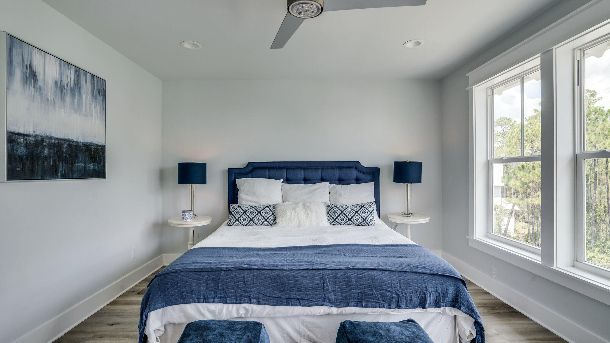 393 Redbud Ln Inlet Beach Inlet Beach, FL 32461 - Photo 24 of 46 a large bed sitting in a bedroom next to a window