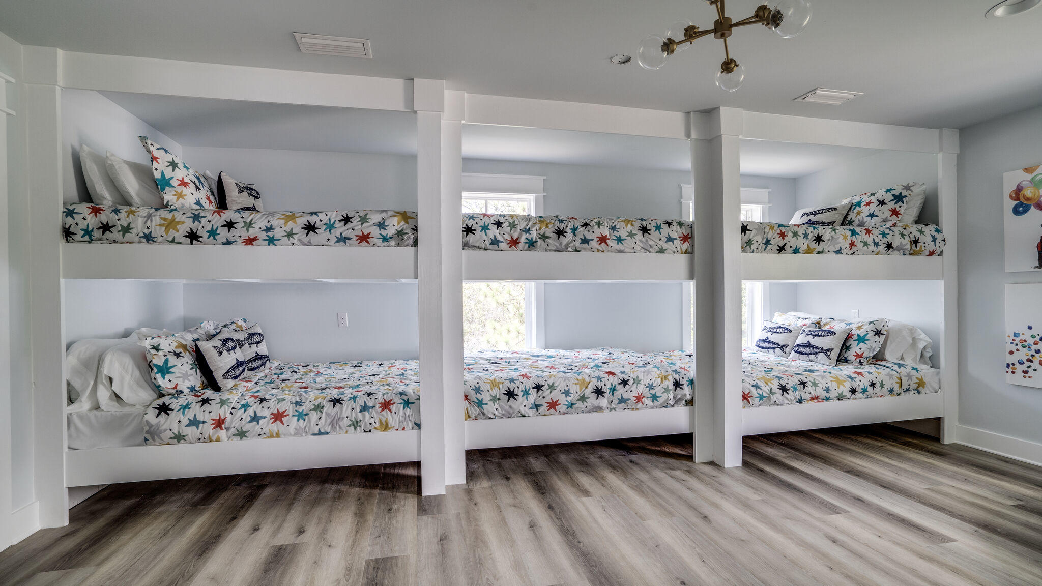 393 Redbud Ln Inlet Beach Inlet Beach, FL 32461 - Photo 27 of 46 a bedroom with bed and wooden floor