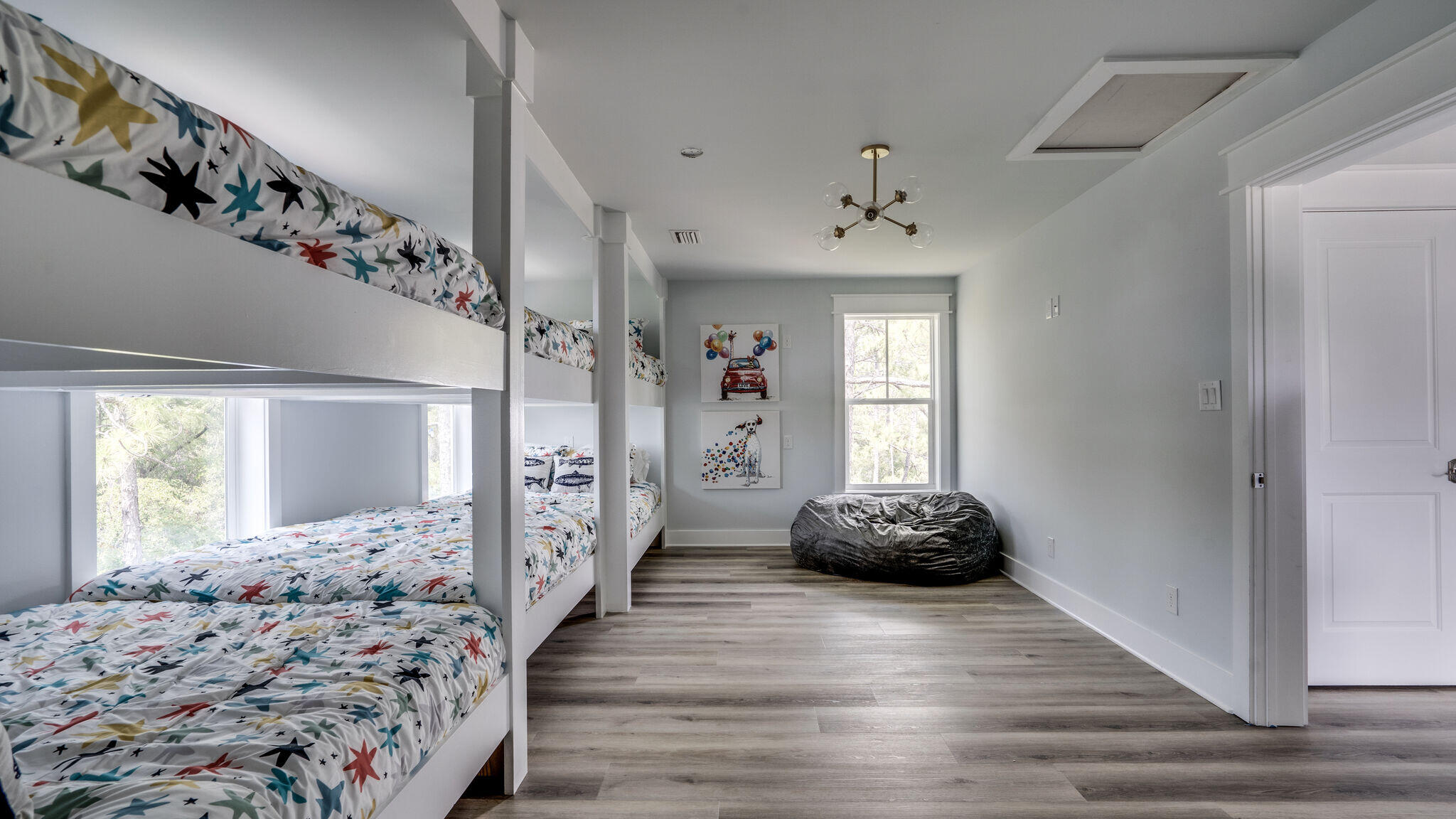 393 Redbud Ln Inlet Beach Inlet Beach, FL 32461 - Photo 28 of 46 a hallway with a bed and a window