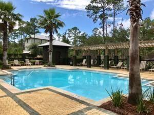 393 Redbud Ln Inlet Beach Inlet Beach, FL 32461 - Photo 45 of 46 a view of a swimming pool with a patio and a yard