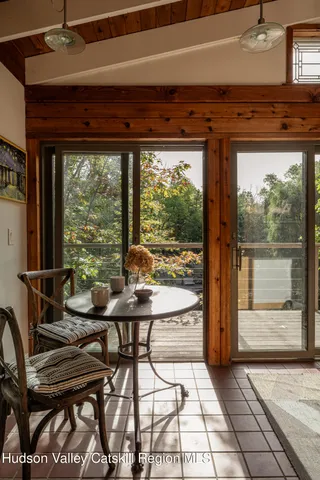 a kitchen with a stove a sink and a microwave